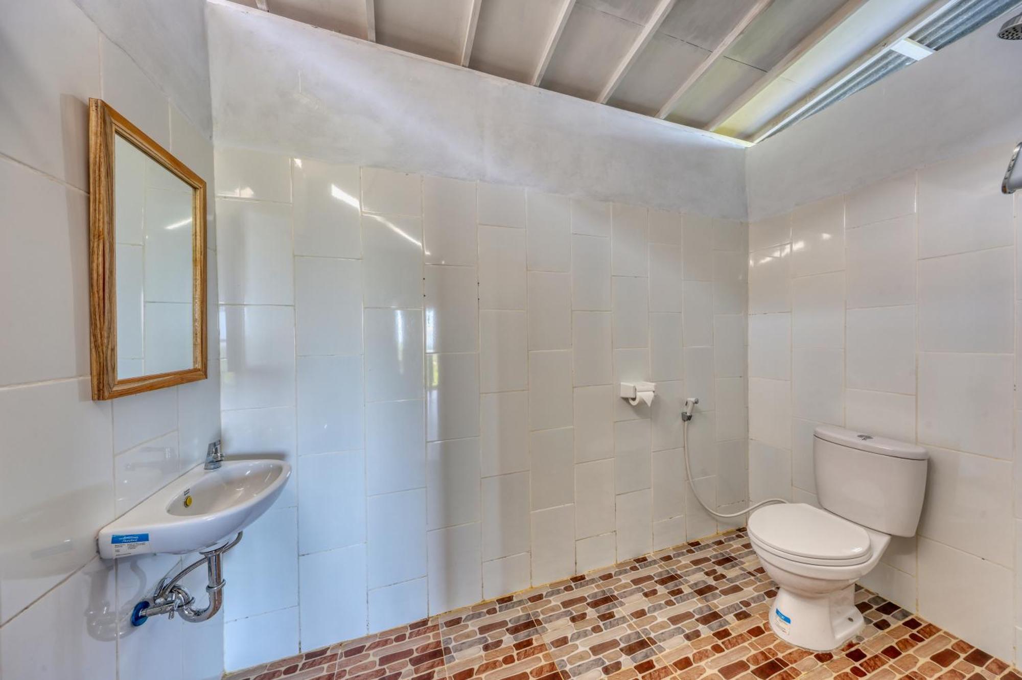 D Sebuluh Bungalow Batumadeg Номер фото