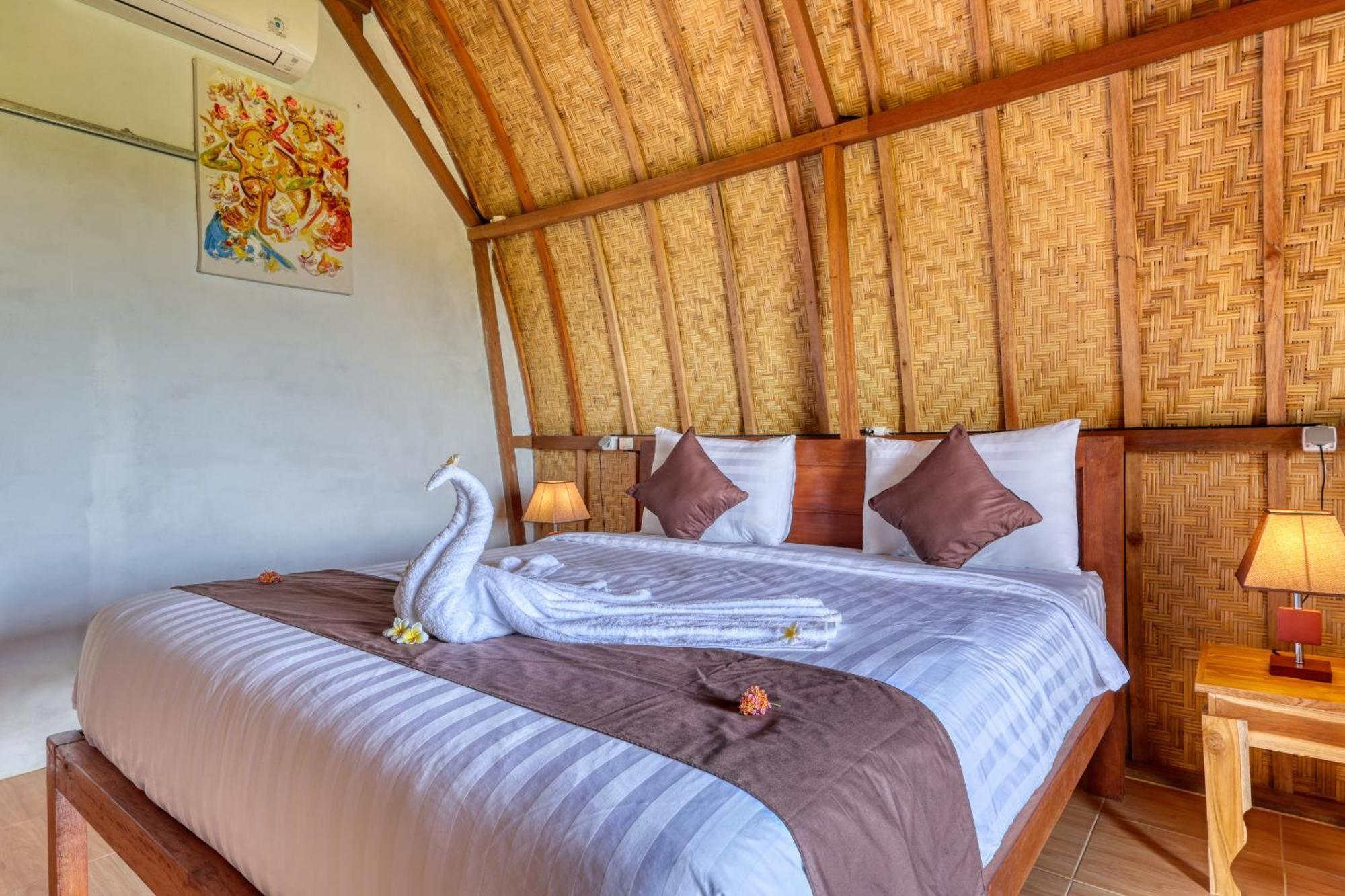 D Sebuluh Bungalow Batumadeg Номер фото