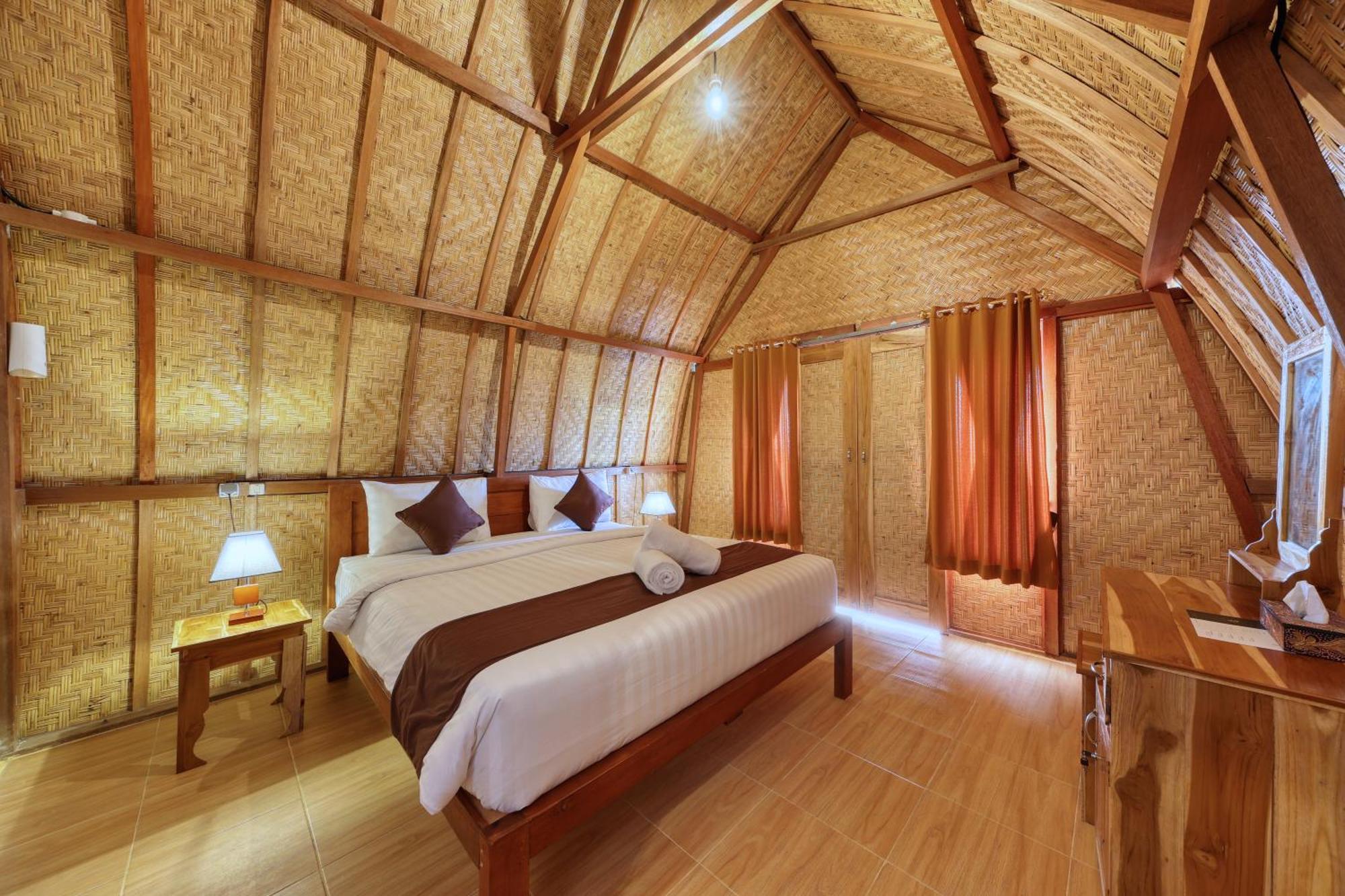 D Sebuluh Bungalow Batumadeg Номер фото